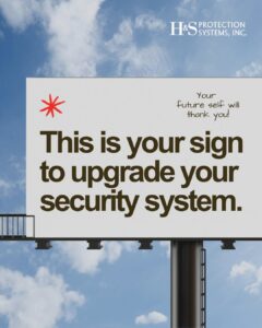 Billboard on a clear blue sky reads, 'This is your sign to upgrade your security system.' with H&S Protection Systems logo in the corner and a red star icon.